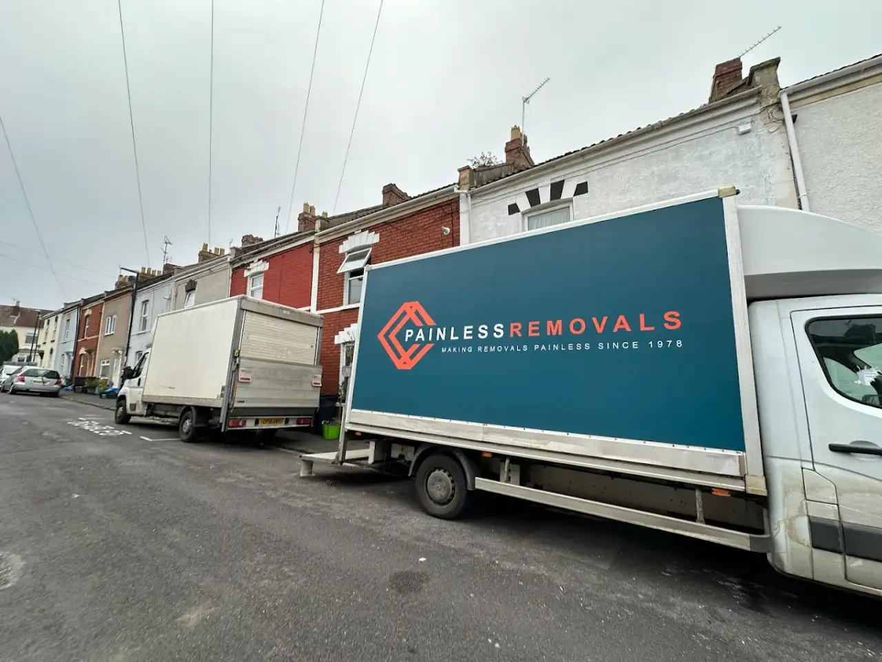 Painless Removals van outside a terraced house on a residential Horfield street near Gloucester Road